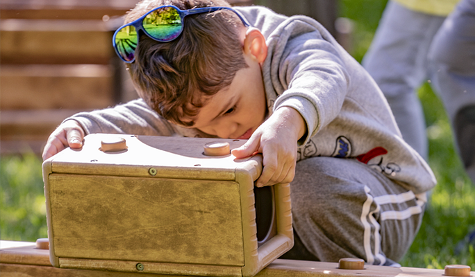 A child playing with Outlast Blocks